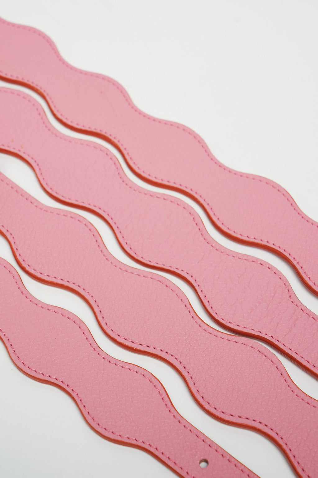 Collar The Wigglers en Tonos rosa y naranja